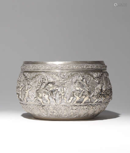 AN INDIAN SILVER BOWL 19TH CENTURY Decorated in repoussé with a continuous scene depicting figures