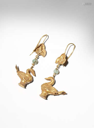 A PAIR OF CHINESE GOLD EARRINGS PROBABLY LIAO DYNASTY Each shaped as a seated goose, their wings and