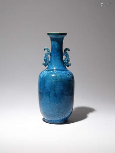 A CHINESE TURQUOISE GLAZED 'LANDSCAPE' VASE QING DYNASTY The body and tall neck incised with