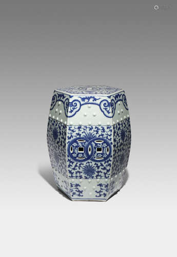 A CHINESE BLUE AND WHITE HEXAGONAL-SECTION GARDEN SEAT 19TH CENTURY Painted with lotus flowerheads