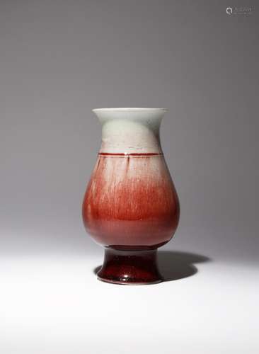 A CHINESE LANGYAO PEAR-SHAPED VASE 18TH/19TH CENTURY The body supported on a tall spread foot and