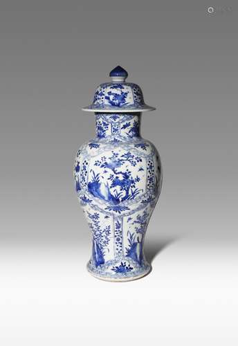 A CHINESE BLUE AND WHITE BALUSTER VASE AND COVER KANGXI 1662-1722 Painted with panels of various