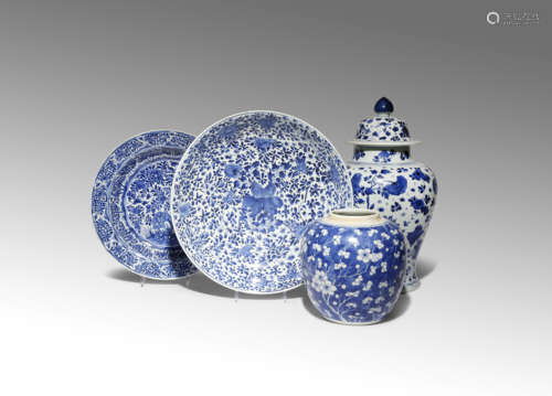 FOUR CHINESE BLUE AND WHITE ITEMS KANGXI 1662-1722 Comprising: an ovoid jar decorated with flowering