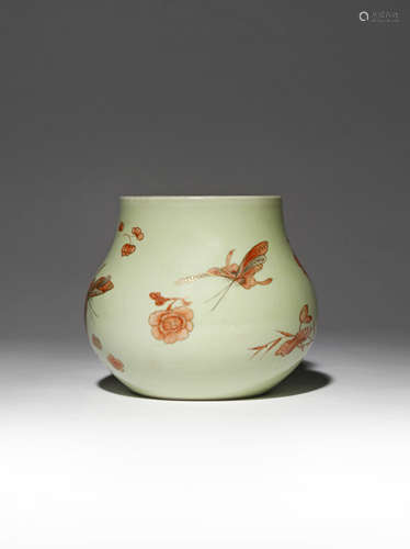 A CHINESE IRON-RED ENAMELLED CELADON-GROUND 'BUTTERFLY' VASE 19TH CENTURY The squat pear-shaped body