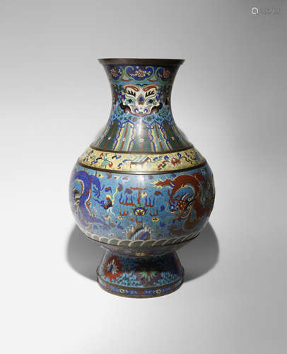 A LARGE CHINESE CLOISONNE 'DRAGON' HU-SHAPED VASE 19TH CENTURY Decorated with dragons chasing