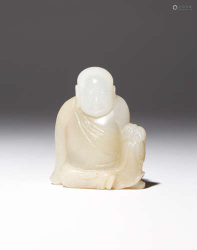 A CHINESE WHITE JADE CARVING OF A LUOHAN QING DYNASTY Depicted seated dressed in monk's robes, his