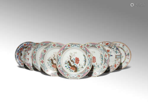 EIGHT CHINESE FAMILLE ROSE DISHES 18TH CENTURY Comprising: a set of four plates painted with