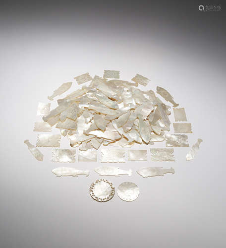 A COLLECTION OF CHINESE MOTHER OF PEARL COUNTERS 19TH CENTURY Comprising: 125 shaped as fish, thirty