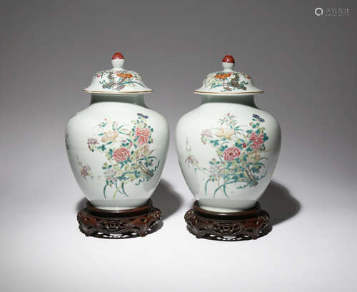 A PAIR OF CHINESE FAMILLE ROSE OVOID VASES AND COVERS REPUBLIC PERIOD Painted with bunches of