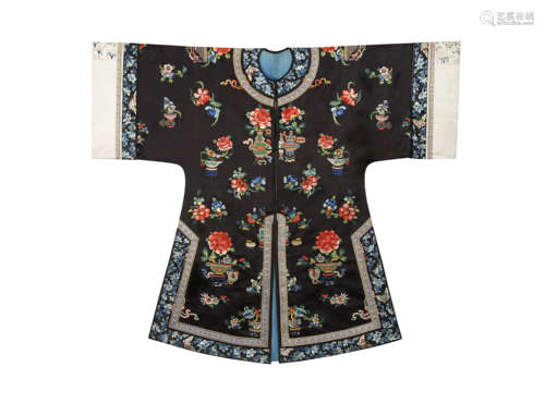 A CHINESE BLACK-GROUND EMBROIDERED SILK ROBE LATE QING DYNASTY Decorated with sprays of many