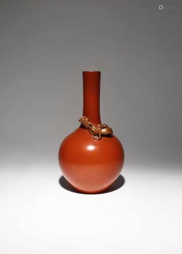 A CHINESE CORAL-GROUND 'CHILONG' BOTTLE VASE EARLY 20TH CENTURY The exterior decorated in a