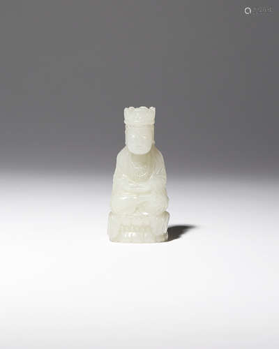 A CHINESE PALE CELADON JADE CARVING OF GUANYIN QING DYNASTY Depicted seated in dhyanasana upon a