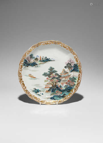 A CHINESE FAMILLE ROSE MOULDED 'LANDSCAPE' DISH QIANLONG 1736-95 Painted with pagodas and