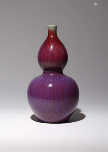 A CHINESE FLAMBE GLAZED GOURD-SHAPED VASE, HULUPING QING DYNASTY The exterior brightly decorated