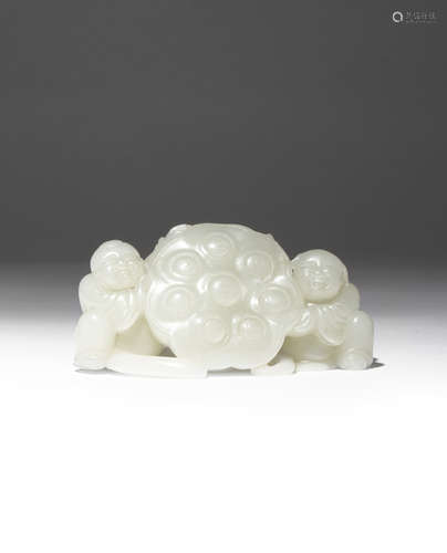 A CHINESE PALE CELADON JADE 'LOTUS AND BOYS' CARVING QING DYNASTY Formed as two kneeling children