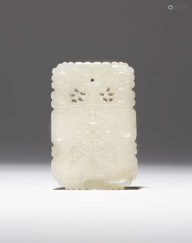 A CHINESE WHITE JADE PENDANT 18TH/19TH CENTURY The rectangular body carved to one side with twin-