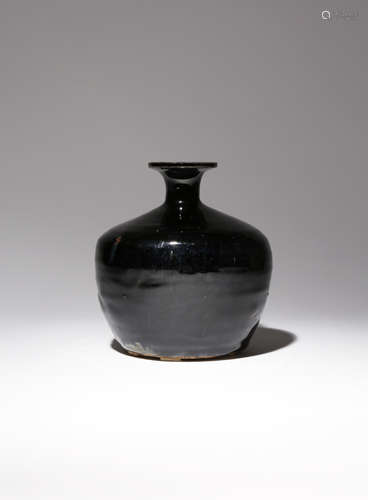 A CHINESE BLACK GLAZED VASE PROBABLY SONG DYNASTY The stout body tapering gently towards the foot,