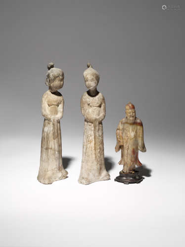 A CHINESE SOAPSTONE FIGURE OF A SCHOLAR QING DYNASTY Depicted standing wearing a cap and long