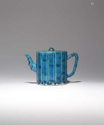 A CHINESE TURQUOISE GLAZED 'BAMBOO' TEAPOT AND COVER KANGXI 1662-1722 The cylindrical body moulded