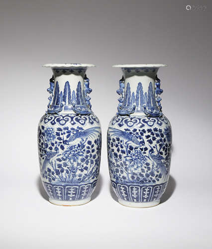 A PAIR OF CHINESE BLUE AND WHITE 'BIRDS AND FLOWERS' VASES 19TH CENTURY Painted with pairs of