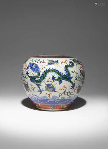 A CHINESE WUCAI 'DRAGON' VASE 19TH CENTURY The ovoid body brightly painted with two scaly dragons in