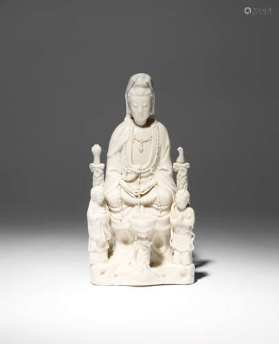 A CHINESE BLANC DE CHINE FIGURE OF GUANYIN 17TH/EARLY 18TH CENTURY The goddess sits in dhyanasana on