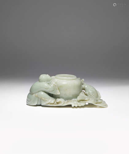 A CHINESE CELADON JADE BRUSH WASHER QING DYNASTY The beehive-shaped pot surrounded by a crouching