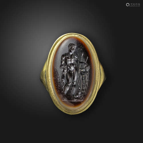 A late 18th century sardonyx intaglio depicting Meleager, with his hunting dog and a boar's head