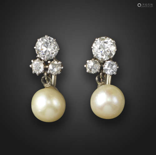 A pair of natural pearl and diamond drop earrings, the three graduated old cushion-shaped diamonds