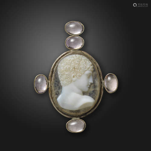 A late 18th century sardonyx cameo pendant, depicting the head of a youth, set in silver in a