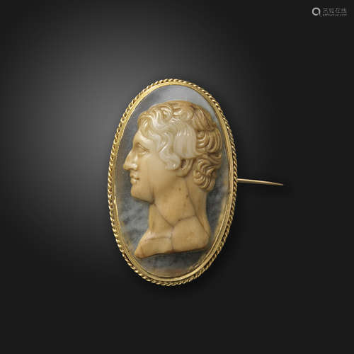 A French early 19th century sardonyx cameo brooch, the cameo depicting a gentleman in profile, in