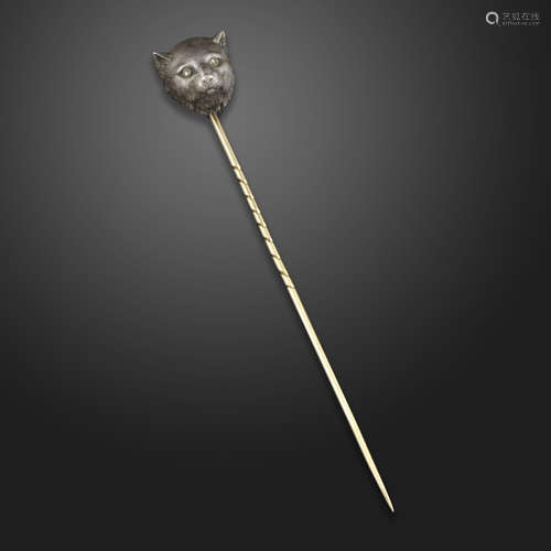 An early 20th century diamond-set tie pin, designed as a cat's head with rose-cut diamond eyes in