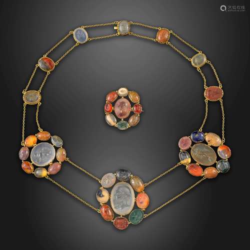 A gold necklace set with early 17th century hardstone intaglios, formed with three clusters set with