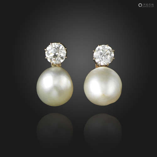 A pair of natural pearl and diamond earrings, the natural pearls suspend from old circular-cut