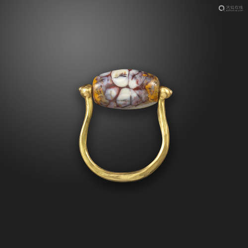 An ancient jasper bead-mounted gold ring, the ancient drilled bead mounted in a later Italian