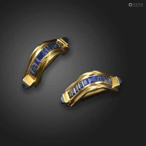 A pair of sapphire-set gold cufflinks, of stirrup form and set with calibre-cut sapphires, with