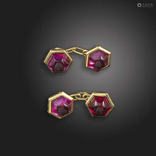 A pair of synthetic ruby-set gold cufflinks, the hexagonal gold cabochons set in yellow gold