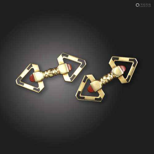 A pair of coral and black enamel triangular gold cufflinks, c.1940, set with sugarloaf corals and