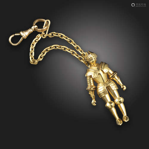 An unusual French gold knight pendant, the realistically formed articulated knight with engraved