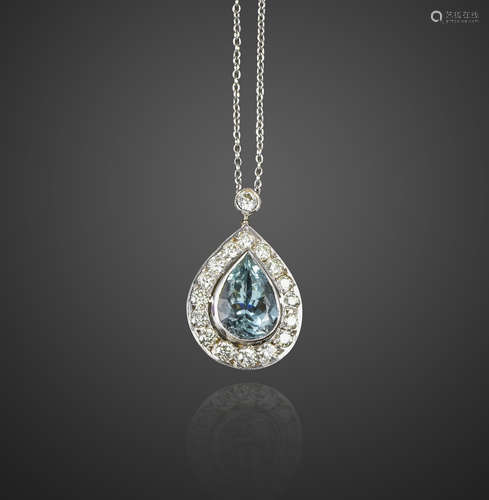 An aquamarine and diamond necklace, the pear-shaped aquamarine set within a surround of round