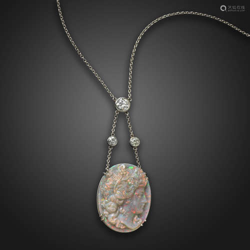 An Edwardian diamond opal cameo pendant, attributed to Wilhelm Schmidt (1845 - 1938), the oval