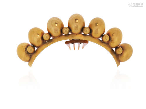 λ A mid 19th century silver gilt hair ornament, the graduated seven ovoids alternately-set with