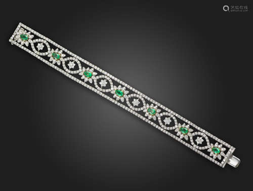 An emerald and diamond bracelet, set with pear-shaped emerald and diamond clusters, alternately-