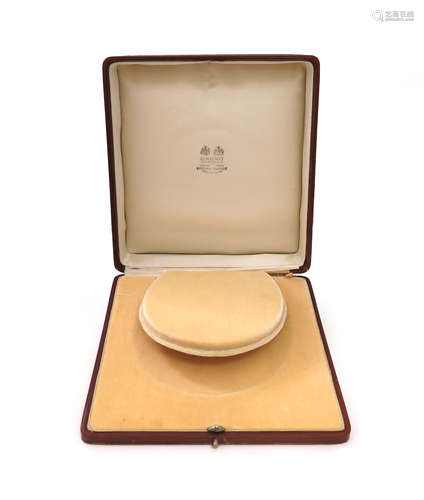 A leather fitted tiara case by Chaumet, the brown leather box with cream velvet interior and silk