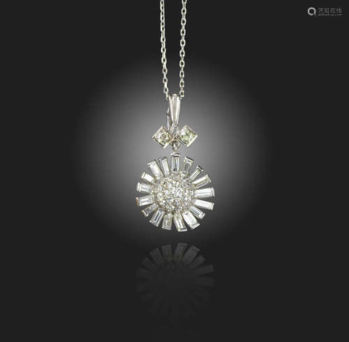 A diamond-set pendant, pave-set with round brilliant-cut diamonds within a spray surround of