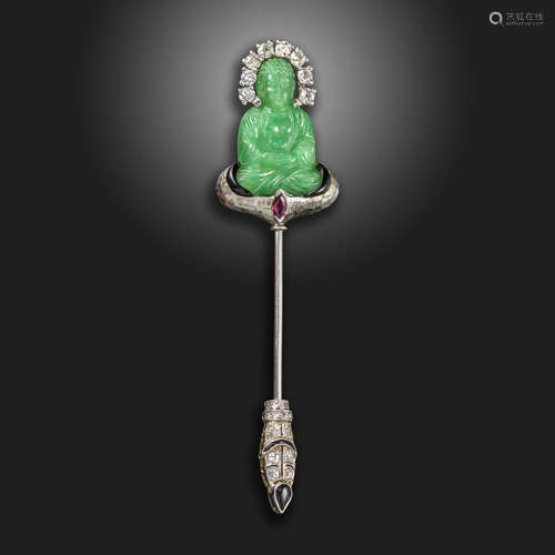 An Art Deco gem-set white gold stick pin by Ghiso, the seated green glass Buddha set with old