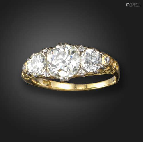 A Victorian diamond three-stone ring, the three graduated old circular-cut diamonds weigh