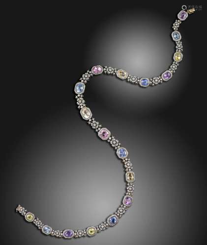 A sapphire and diamond cluster necklace, set with old oval and cushion-shaped vari-coloured