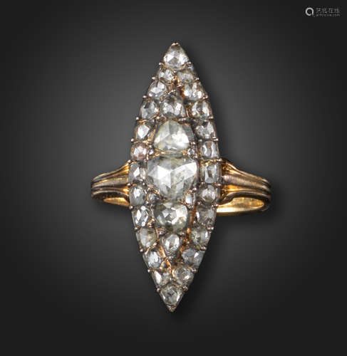 A navette-shaped diamond cluster ring, set overall with graduated rose-cut diamonds in silver on