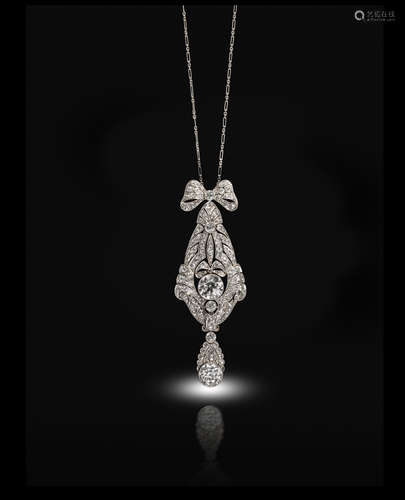 A Belle Époque diamond bow pendant, pavй-set with diamonds, a bow suspends the decoratively